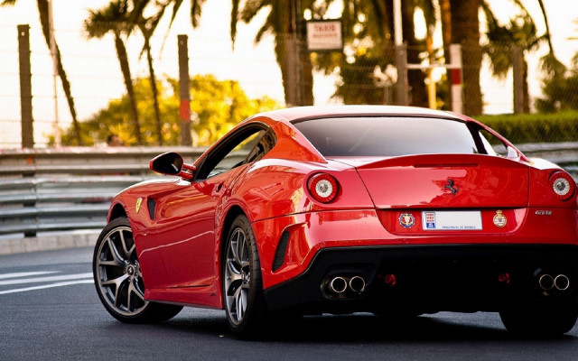 Red sports car palm trees free wallpaper for desktop - medium preview image