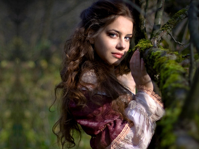 Woman dress holding tree branch #2 free wallpaper for desktop - medium preview image