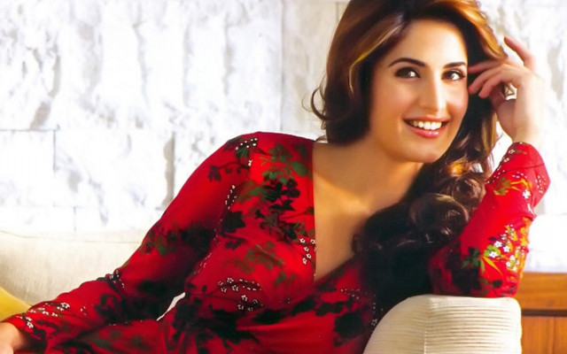 Woman red dress couch smiling free wallpaper for desktop - medium preview image