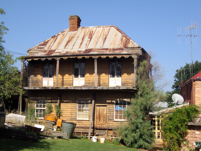Rusty roof house green lawn free wallpaper for desktop - medium preview image