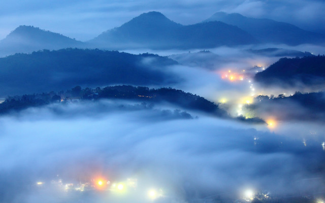 Foggy night city mountains lights free wallpaper for desktop - medium preview image