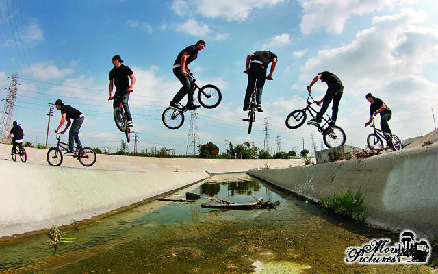 Man bike tricks air pond free wallpaper for desktop - medium preview image