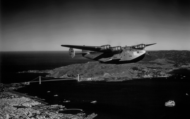 Airplane flying water mountains bridge free wallpaper for desktop - medium preview image