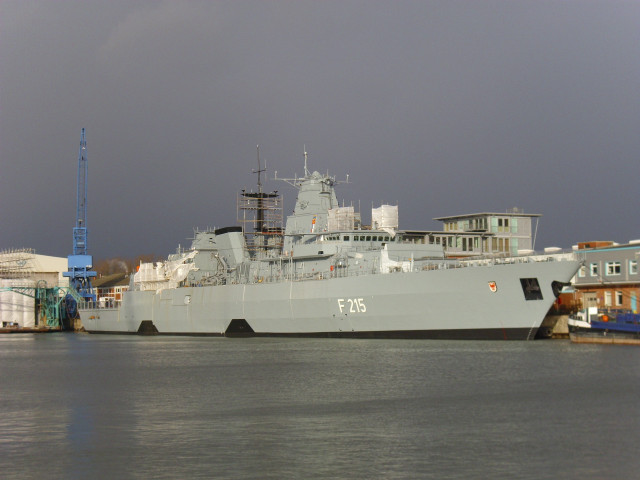 Large ship docked harbor buildings free wallpaper for desktop - medium preview image