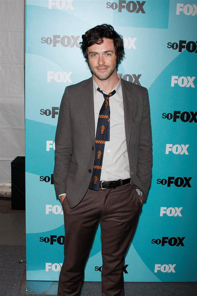 Man suit tie blue wall free wallpaper for mobile - medium preview image