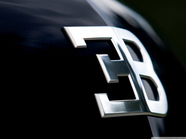 Car emblem closeup vehicle hood free wallpaper for desktop - medium preview image