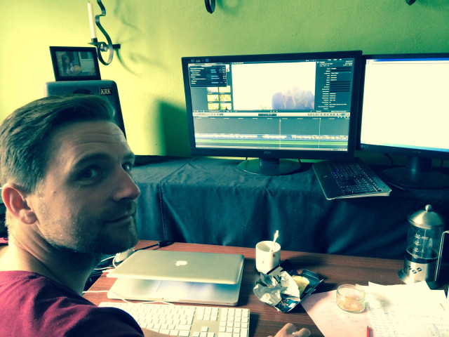 Man sitting desk computer laptop free wallpaper for desktop - medium preview image