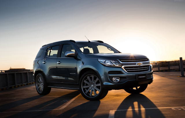Chevrolet suv parking lot sunset free wallpaper for desktop - medium preview image
