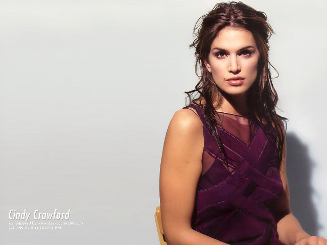 Woman sitting chair arms crossed free wallpaper for desktop - medium preview image