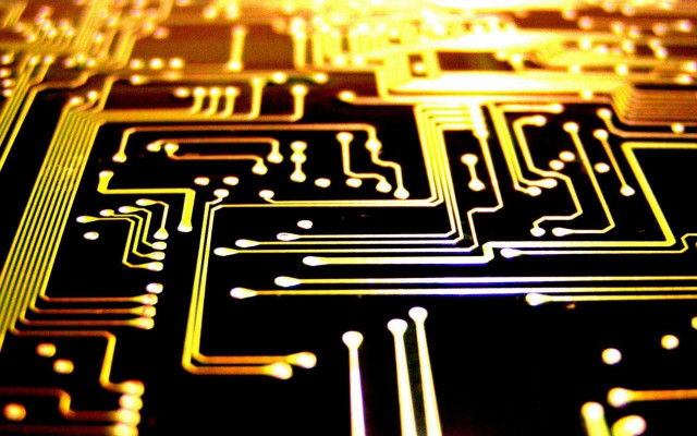 Circuit board closeup yellow black free wallpaper for desktop - medium preview image