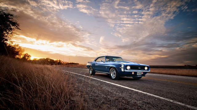 Blue car driving road cloudy free wallpaper for desktop - medium preview image