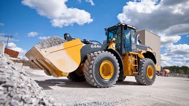 Large yellow tractor gravel building free wallpaper for desktop - medium preview image