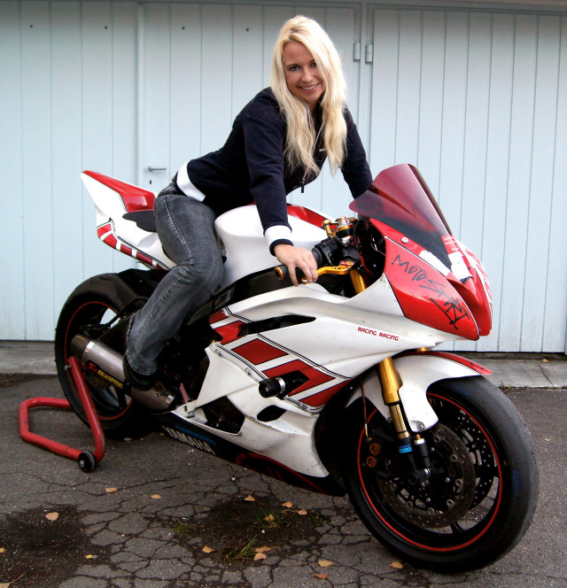 Woman motorcycle building garage red free wallpaper for tablet - medium preview image