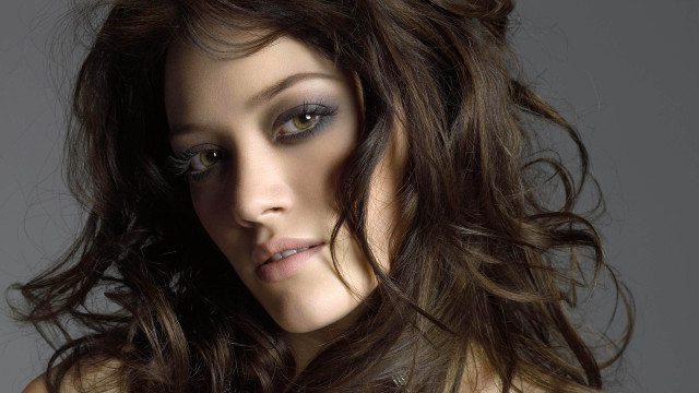 Woman longhair blueeye serious hyperrealism free wallpaper for desktop - medium preview image