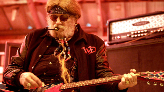 Man beard glasses guitar room free wallpaper for desktop - medium preview image