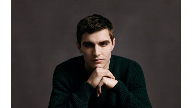 Man serious hands chin looking free wallpaper for desktop - medium preview image