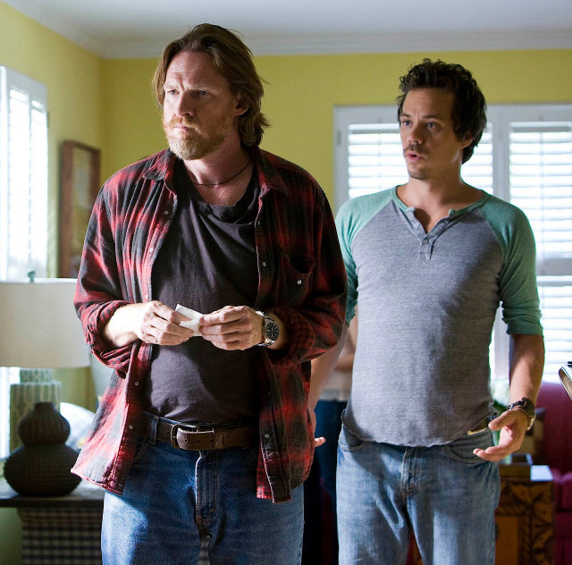 Two men living room holding free wallpaper for tablet - medium preview image