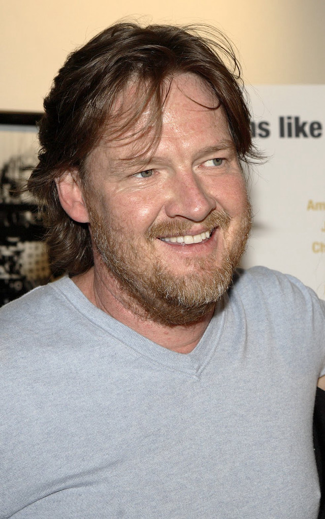 Man beard grey shirt smiling free wallpaper for mobile - medium preview image