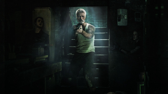Man holding gun dark room #2 free wallpaper for desktop - medium preview image