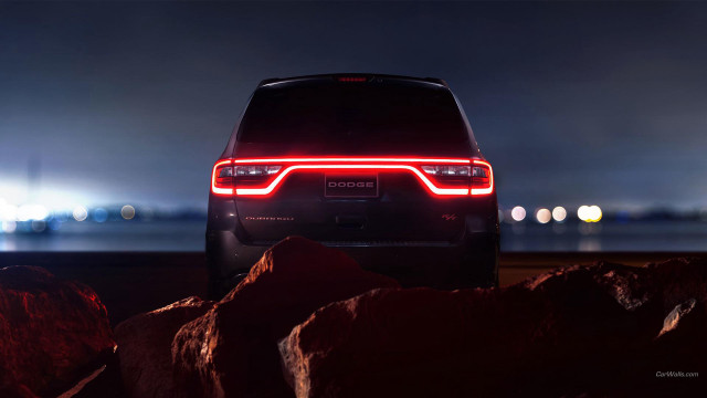 Car parked rocky beach night free wallpaper for desktop - medium preview image