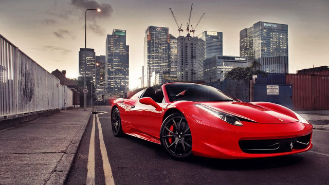 Red sports car night cityscape free wallpaper for desktop - medium preview image
