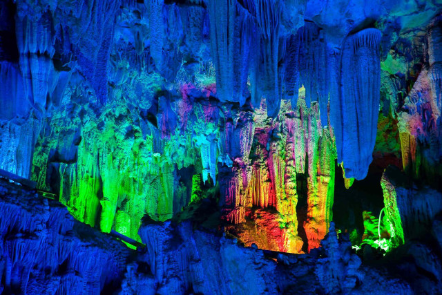 Cave people colorful lights standing free wallpaper for desktop - medium preview image
