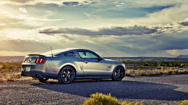 Silver mustang desert gravel road free wallpaper for desktop - medium preview image