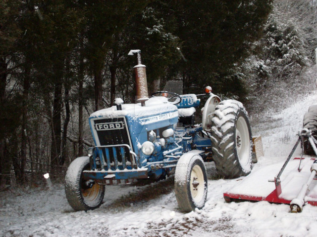 Tractor parked snow man snow free wallpaper for desktop - medium preview image