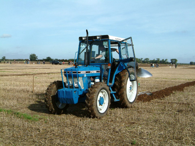 Blue tractor field sky people free wallpaper for desktop - medium preview image