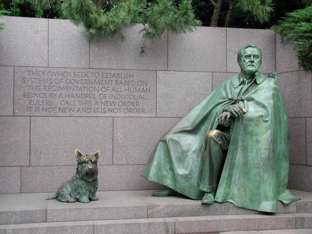 Statue man dog sitting wall free wallpaper for desktop - medium preview image