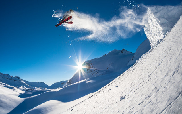 Snowboarder snowy mountain slope sunlight free wallpaper for desktop - medium preview image