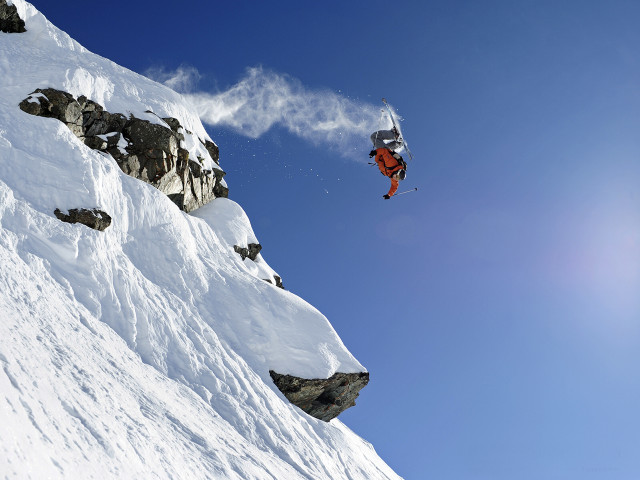 Snowboard jump mountain rocks blue free wallpaper for desktop - medium preview image
