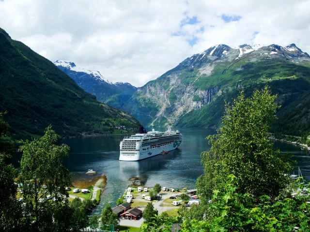 Cruise ship mountain lake surrounding free wallpaper for desktop - medium preview image