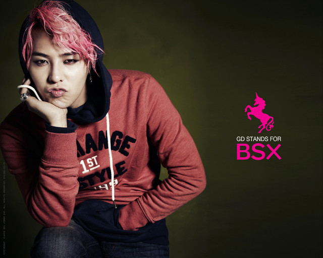 Woman pink hair hoodie pose free wallpaper for desktop - medium preview image