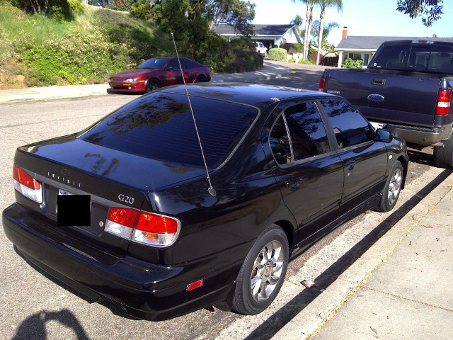 Black car parked road blue free wallpaper for desktop - medium preview image