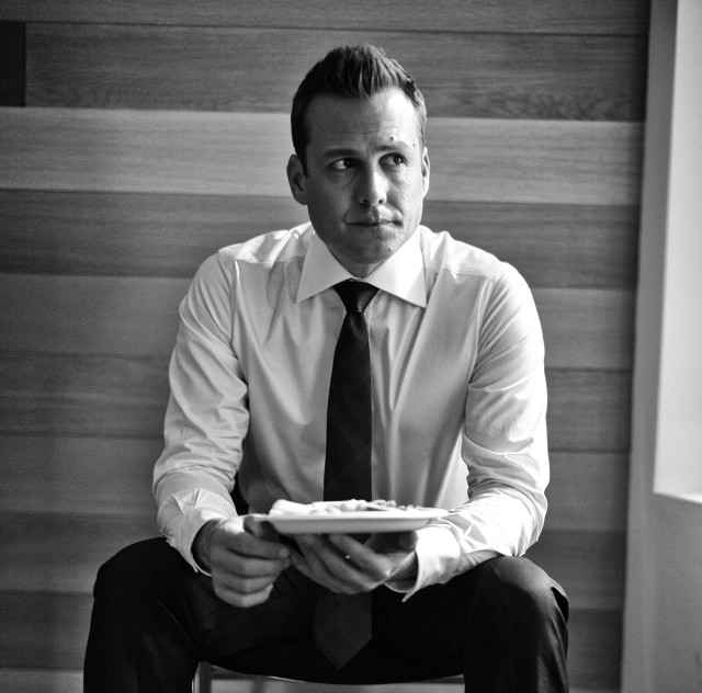 Man tie sitting holding plate free wallpaper for tablet - medium preview image