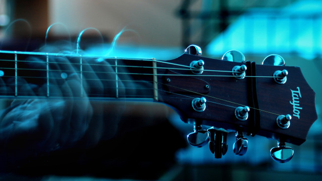 Guitar strings closeup blurry background #2 free wallpaper for desktop - medium preview image