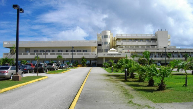 Large building cars parked street free wallpaper for desktop - medium preview image