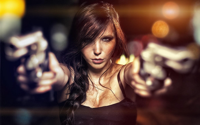 Woman gun pointing camera blurry free wallpaper for desktop - medium preview image