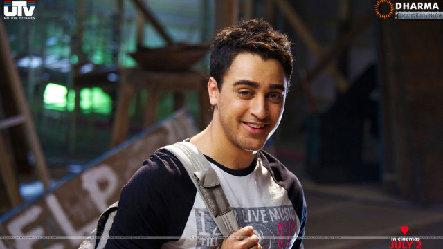 Man backpack smiling camera green free wallpaper for desktop - medium preview image