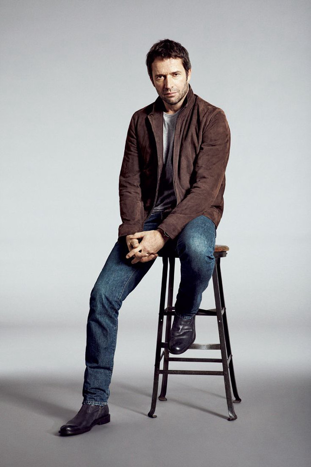 Man sitting stool legs crossed free wallpaper for mobile - medium preview image