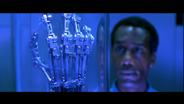 Man robot hand blue lights free wallpaper for desktop - medium preview image