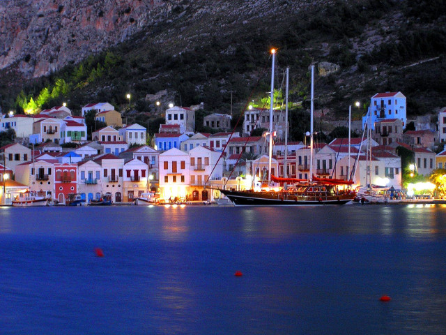 Harbor boats nighttime lights mountain free wallpaper for desktop - medium preview image