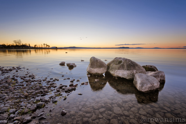 Lake rocks water sunset sky free wallpaper for desktop - medium preview image
