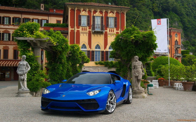 Blue sports car building statue free wallpaper for desktop - medium preview image