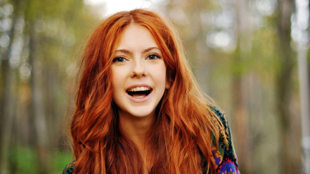 Woman red hair smiling camera #2 free wallpaper for desktop - medium preview image