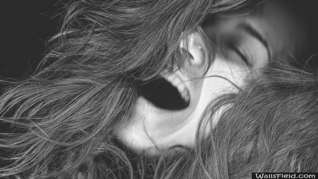 Woman blowing wind closed eyes free wallpaper for desktop - medium preview image