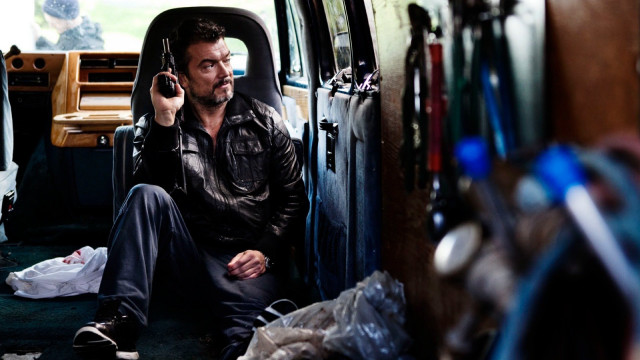 Man sitting truck talking cellphone free wallpaper for desktop - medium preview image