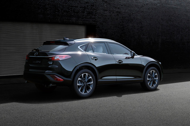 Black mazda suv alley garage free wallpaper for desktop - medium preview image