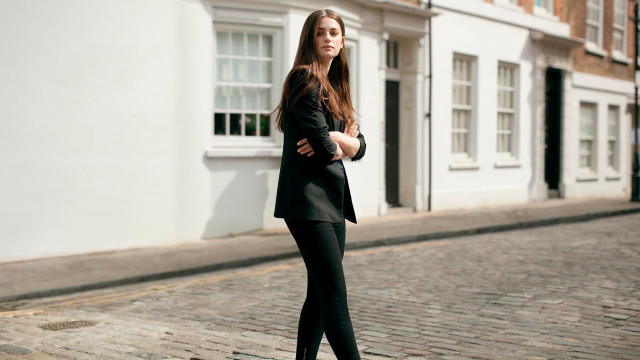 Woman suit brick street white free wallpaper for desktop - medium preview image